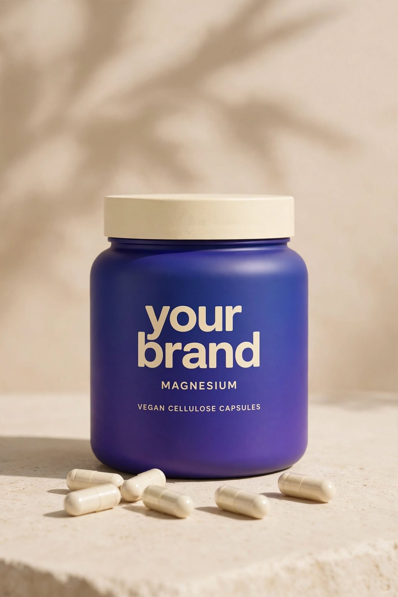 An own-label jar of vegan cellulose capsules with capsules in front
